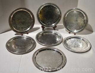 Seven Round Silverplated Serving Trays